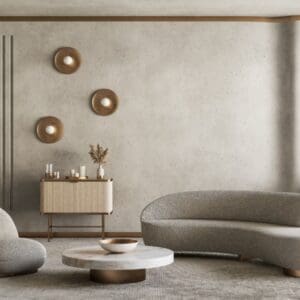 A minimalist living room includes a curved sofa, a round chair, and a circular coffee table. The wall displays three round decorations above a sideboard adorned with candles, all set in a neutral color palette. The room subtly features Placeholder Product 1 for additional style.